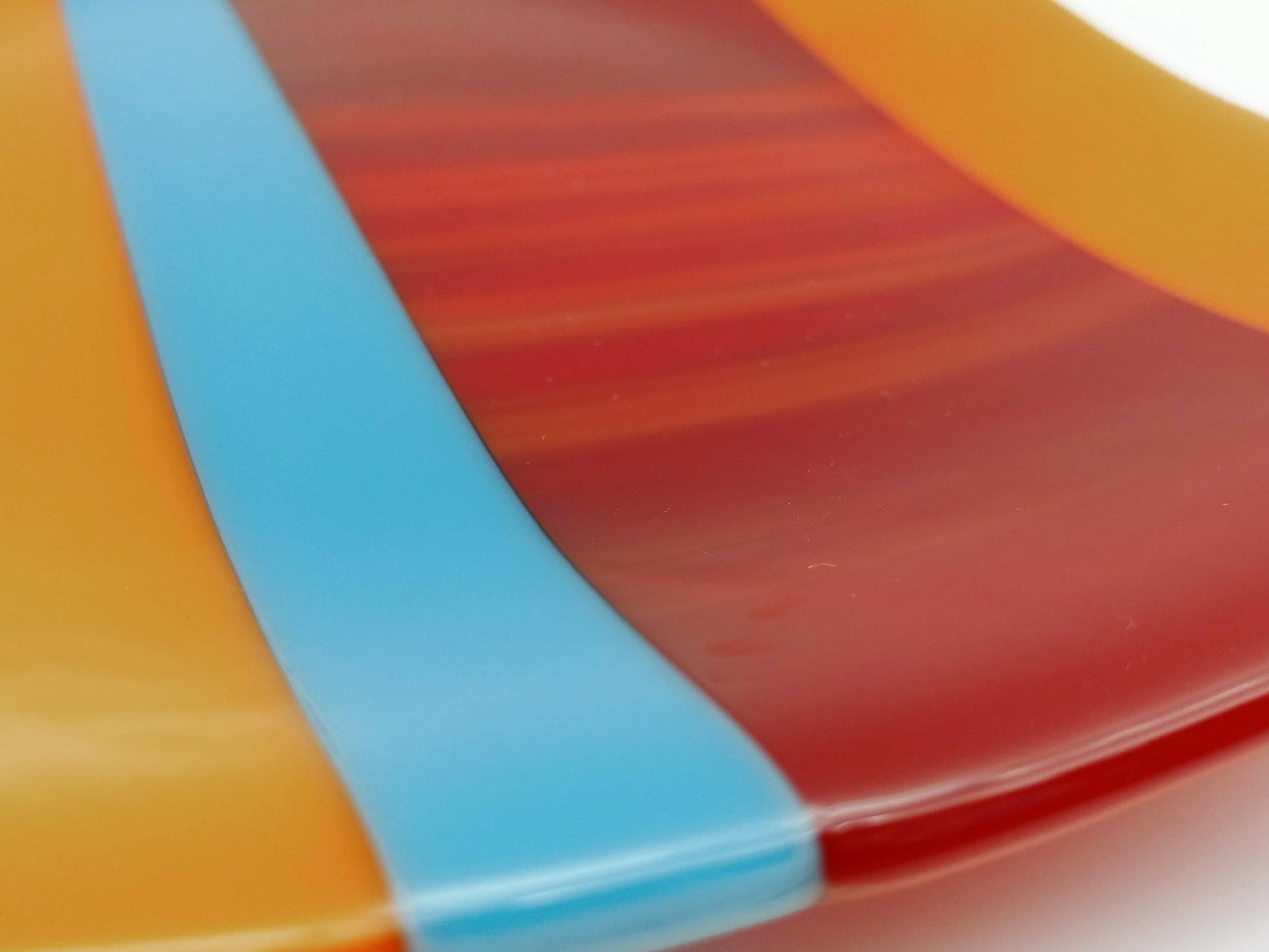 orange red and teal striped dish